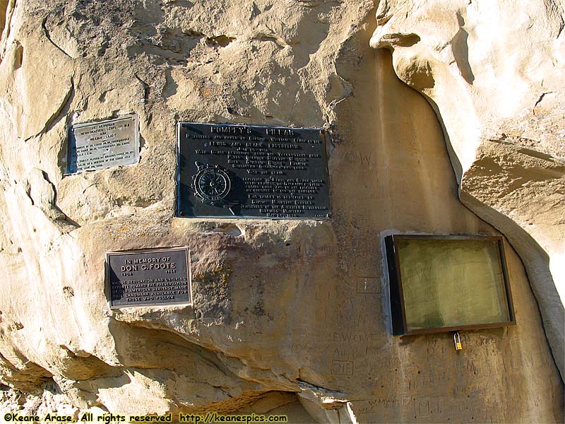 Various plaques next to Clark's mark